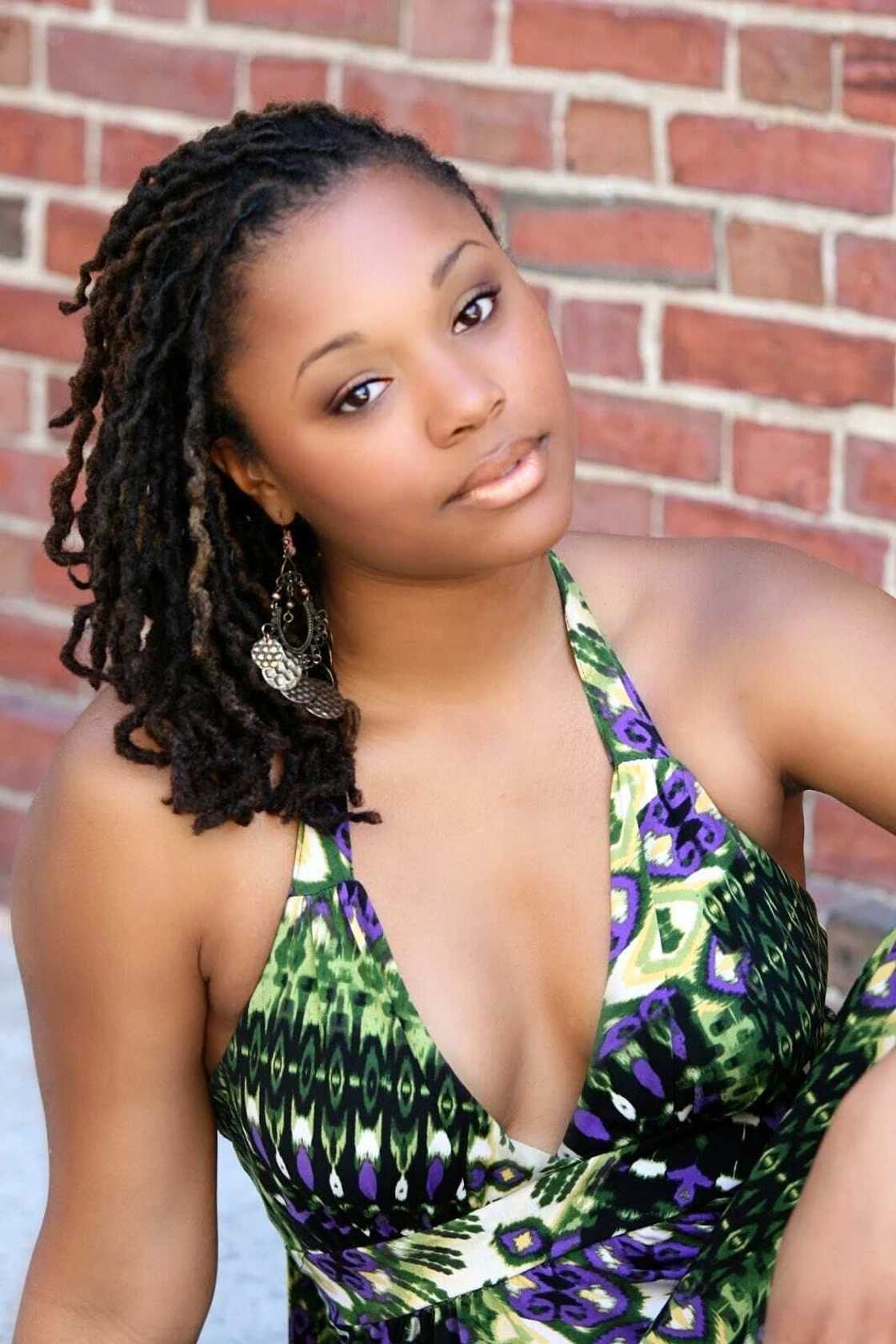 A loosely hanging side dreadlocks A loosely hanging side dreadlocks