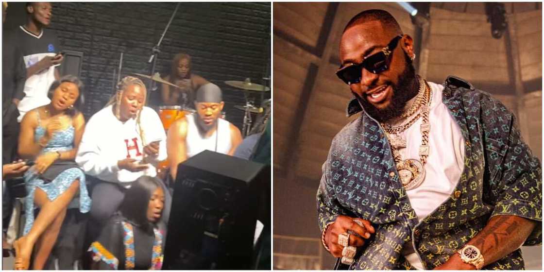 Music group renders Davido's feel, Davido on stage during Timeless concert Music group renders Davido's feel, Davido on stage during Timeless concert