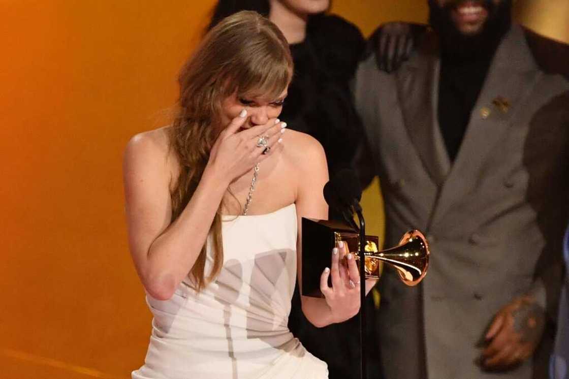 US singer-songwriter Taylor Swift made history with her fourth Album of the Year Grammy, this time for 'Midnights' US singer-songwriter Taylor Swift made history with her fourth Album of the Year Grammy, this time for 'Midnights'