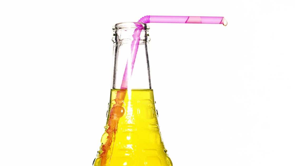 A citrus soda in a glass bottle. A citrus soda in a glass bottle.