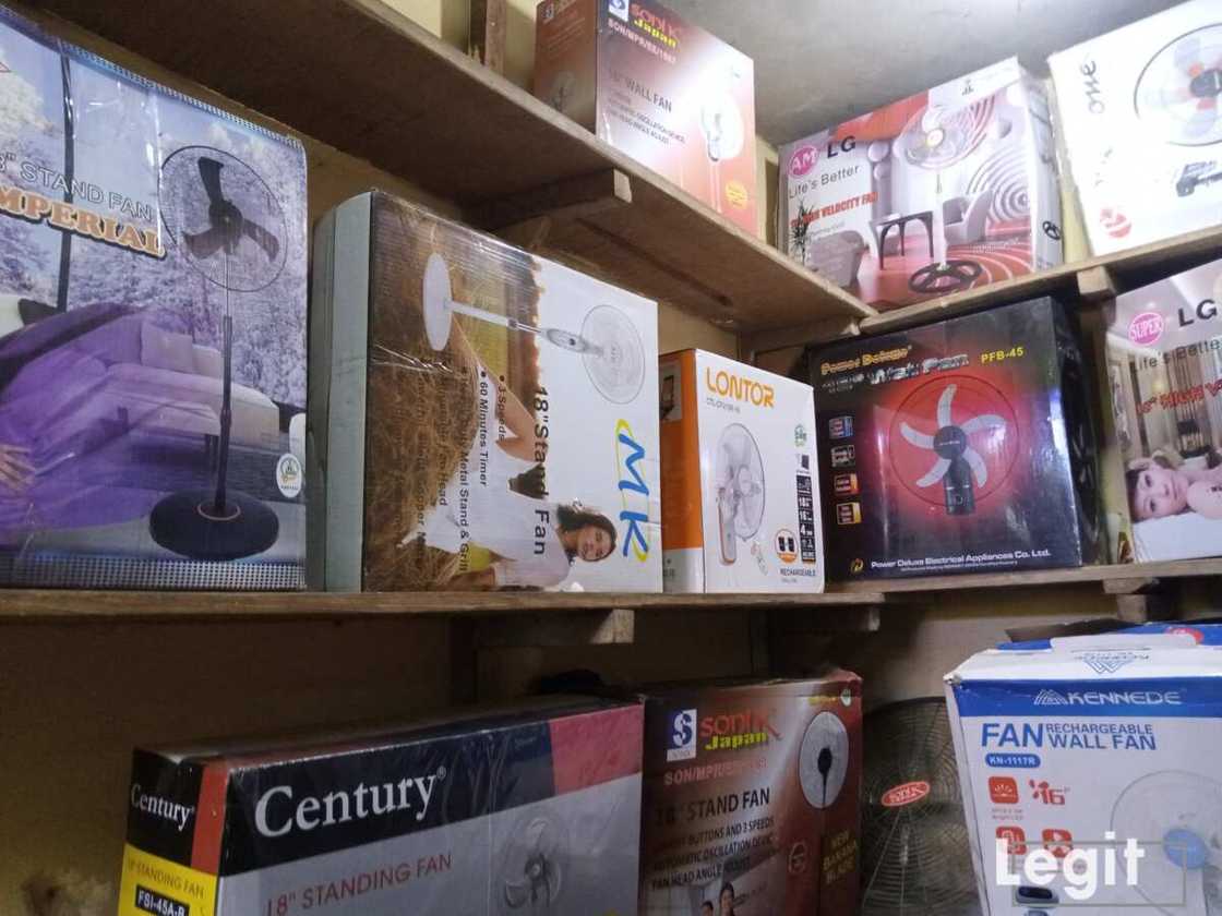 Fans of popular brands on display at a popular market in Lagos. Photo credit: Esther Odili Fans of popular brands on display at a popular market in Lagos. Photo credit: Esther Odili