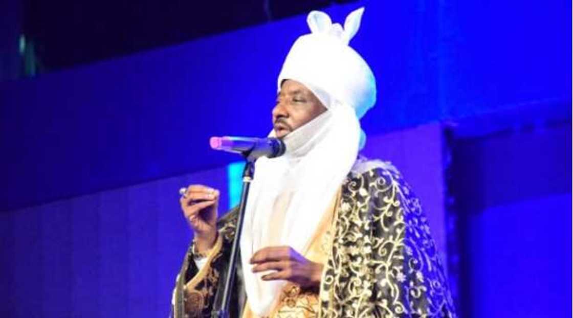 Sanusi speaking at a conference Sanusi speaking at a conference