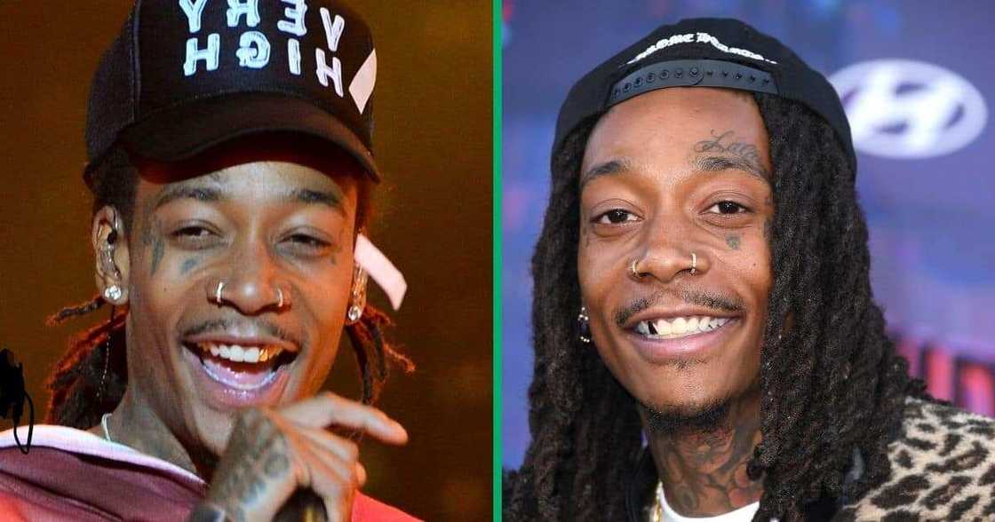 America rapper Wiz Khalifa performing at a concert. America rapper Wiz Khalifa performing at a concert.