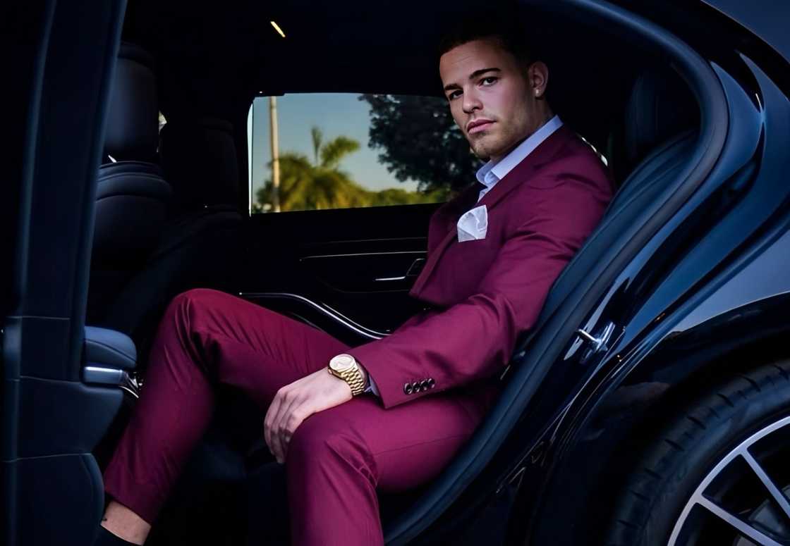 Marco Donatelli poses sitting in a car Marco Donatelli poses sitting in a car