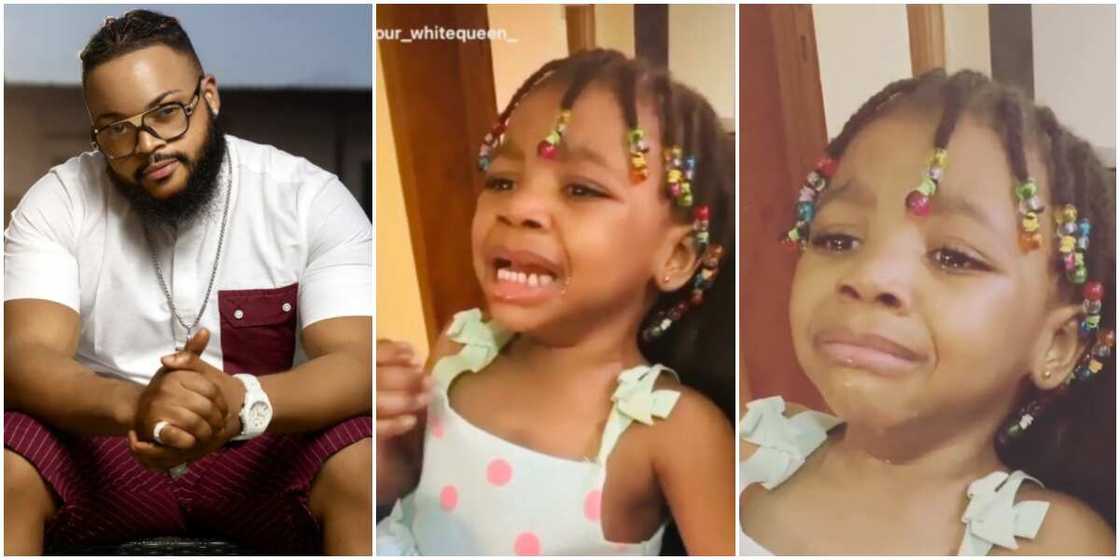 BBNaija star Whitemoney and little girl.