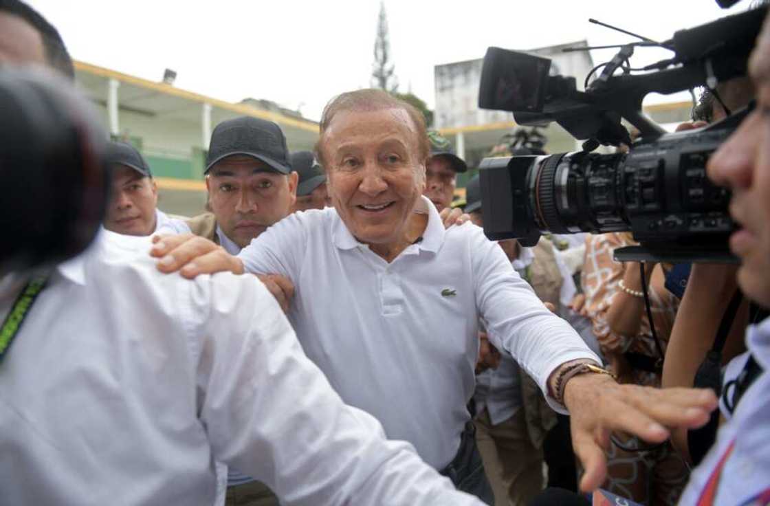 Maverick candidate Rodolfo Hernandez arrives at a polling station in the northern city of Bucaramanga to cast his vote in Colombia's presidential runoff on June 19, 2022