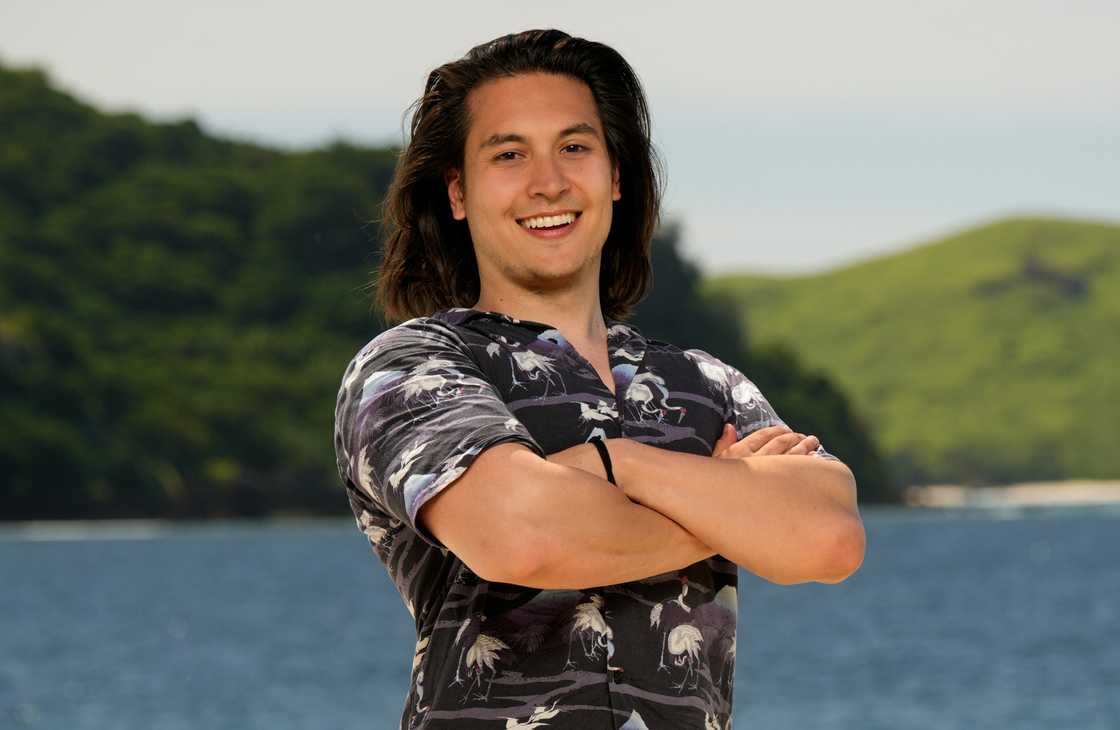 Andy Rueda poses next to a water body Andy Rueda poses next to a water body
