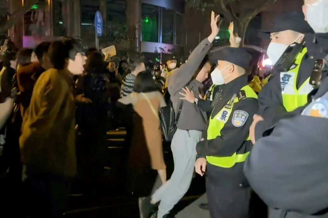 Angry crowds take to the streets in Shanghai as public opposition to China's zero-Covid policy grows