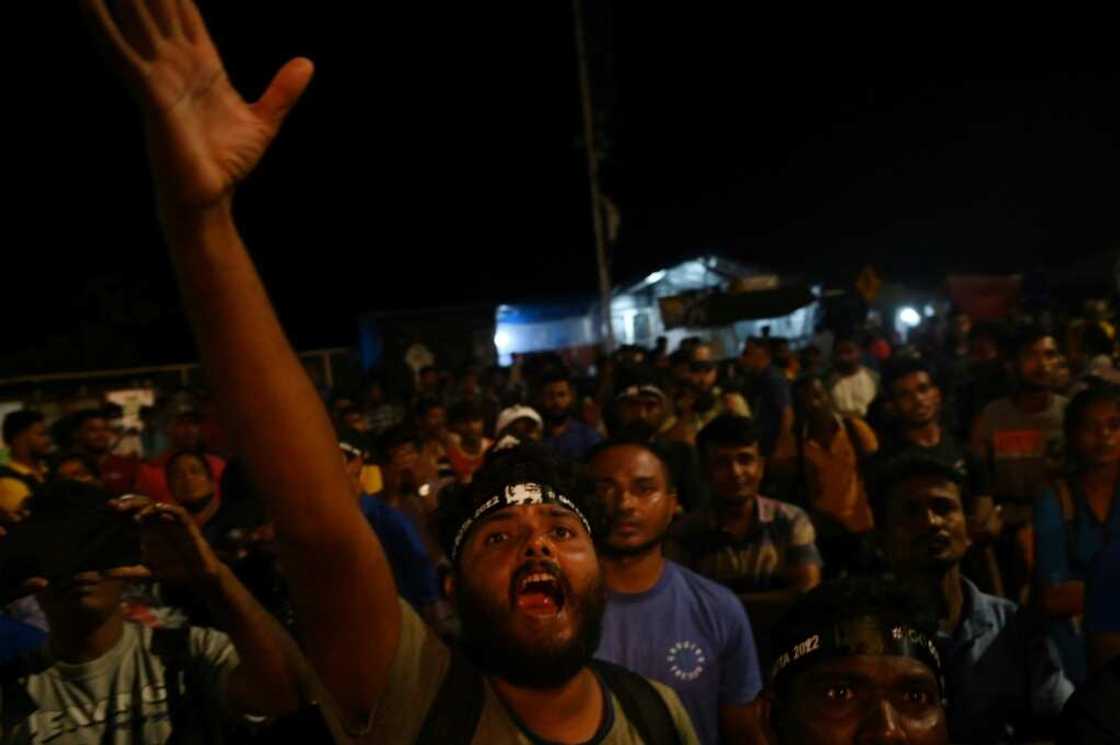 People celebrate the resignation of Sri Lanka's president, outside presidential office in Colombo on July 14, 2022 People celebrate the resignation of Sri Lanka's president, outside presidential office in Colombo on July 14, 2022