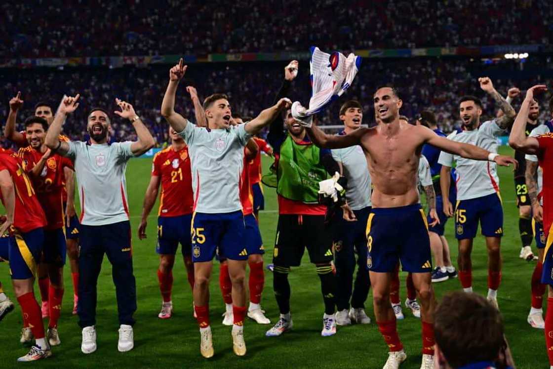 Spain players celebrating after beating France to qualify for Euro 2024 final Spain players celebrating after beating France to qualify for Euro 2024 final