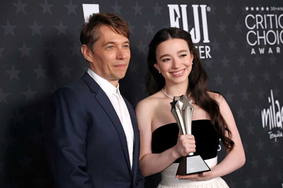 'Anora' -- from director Sean Baker (L) and starring Mikey Madison (R) -- has already won multiple awards, from the Cannes festival's Palme d'Or to prizes from Hollywood's directors, producers, writers and critics