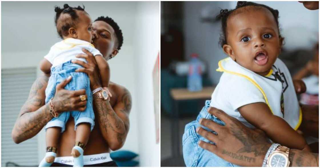 Nigerian singer Wizkid and his baby Nigerian singer Wizkid and his baby