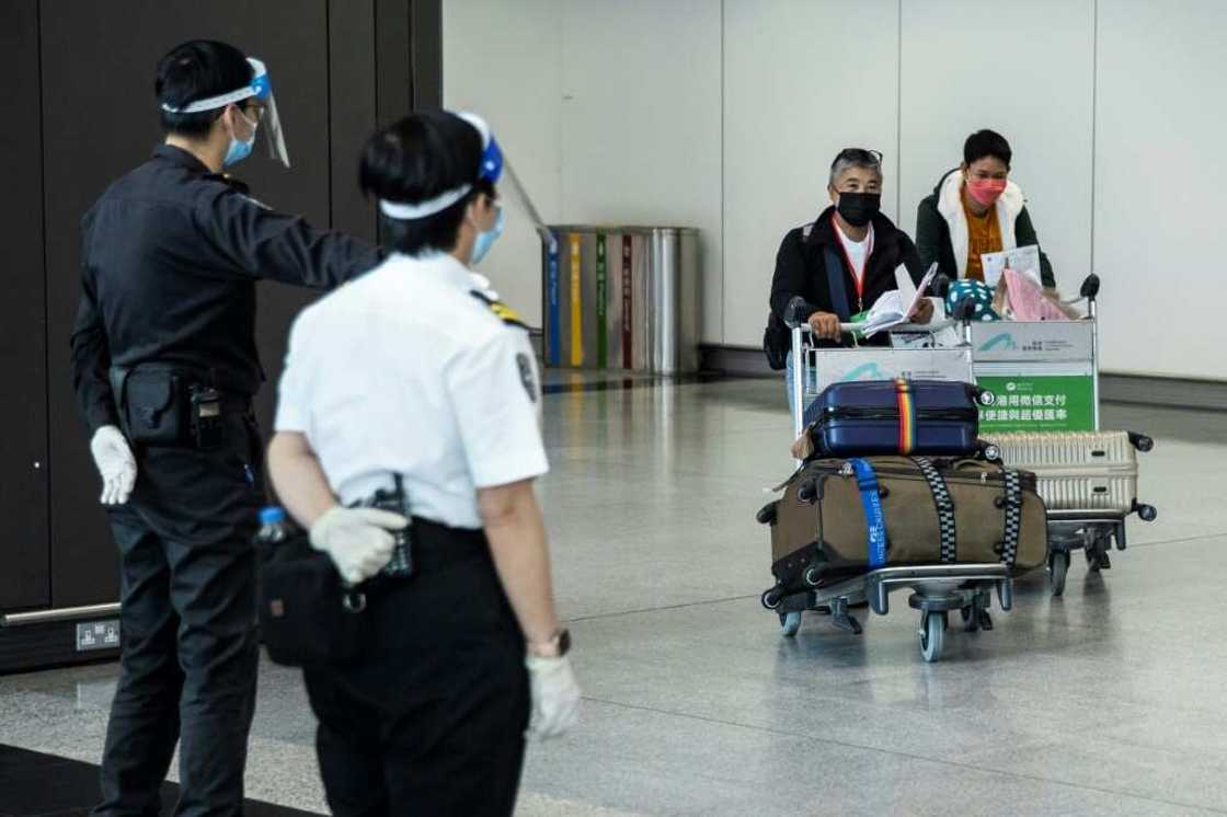 Passengers arriving in Hong Kong now have to spend three days in a quarantine hotel, cut from seven as the city eases some Covid restrictions Passengers arriving in Hong Kong now have to spend three days in a quarantine hotel, cut from seven as the city eases some Covid restrictions