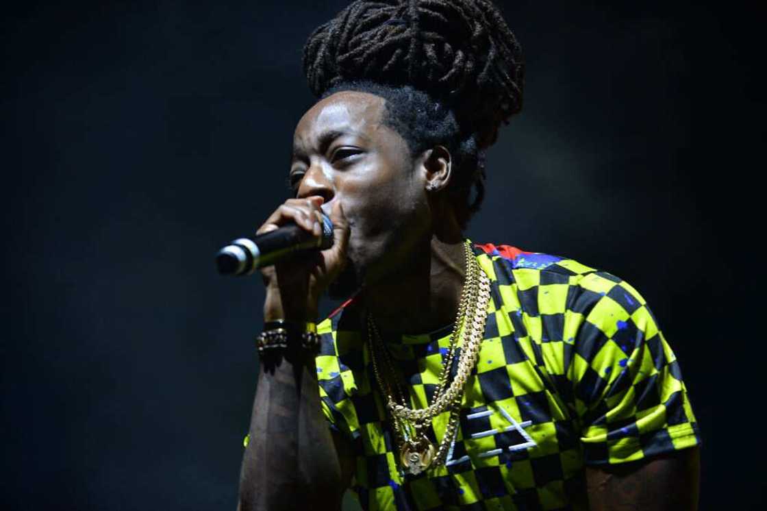 Ace Hood performs on stage at Watsco Center Ace Hood performs on stage at Watsco Center