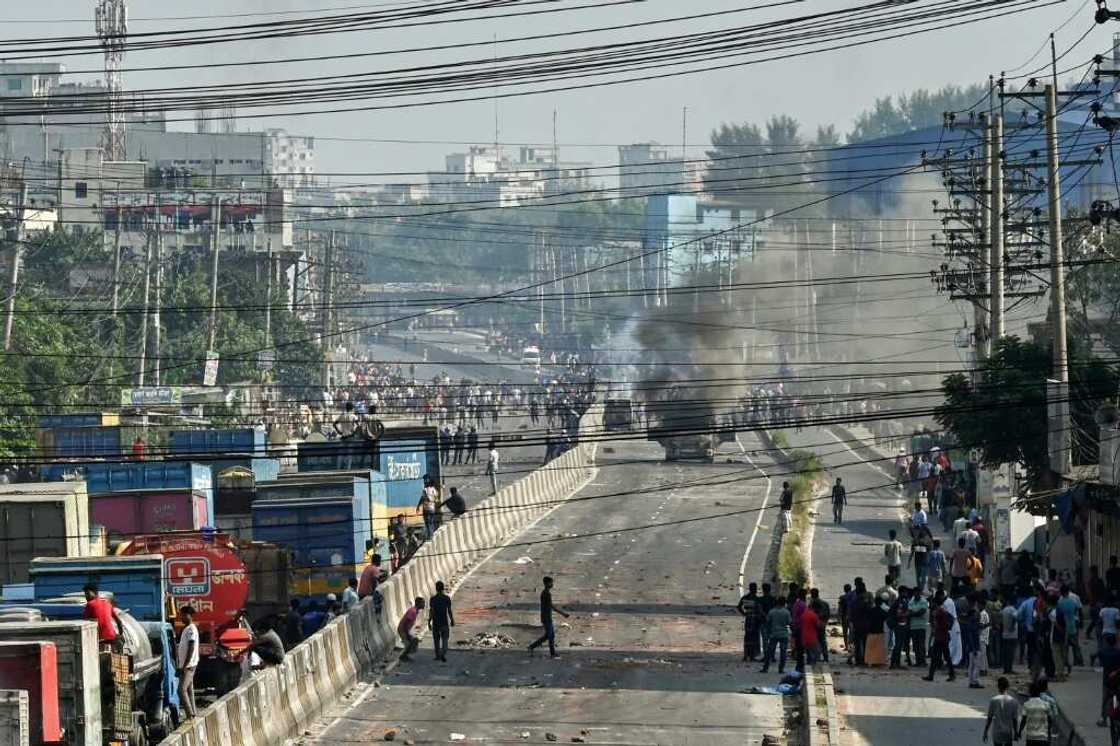 Dozens of factories have been ransacked by striking workers, with several hundred others shuttered by their owners to avoid vandalism Dozens of factories have been ransacked by striking workers, with several hundred others shuttered by their owners to avoid vandalism