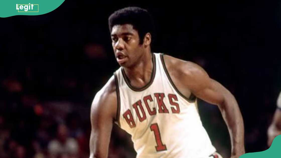 Oscar Robertson in an active stance during a game Oscar Robertson in an active stance during a game