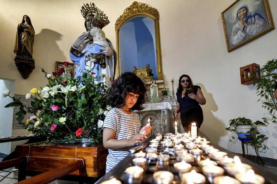 Rresearchers of Italian origin say the procession is an echo of a 'forgotten history' that offers a model for coexistence with migrants of various faiths and ethnicities Rresearchers of Italian origin say the procession is an echo of a 'forgotten history' that offers a model for coexistence with migrants of various faiths and ethnicities