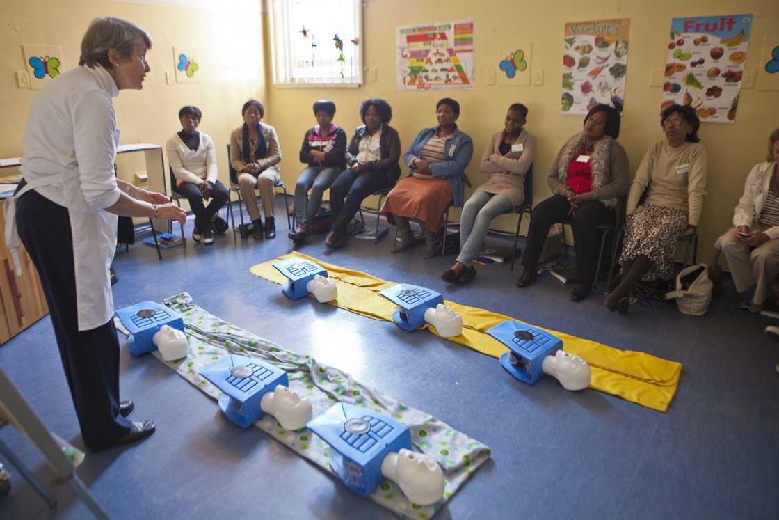 A retired nurse teaches CPR, basic life support, and first aid skills in a hospital clinic in Johannesburg, South Africa A retired nurse teaches CPR, basic life support, and first aid skills in a hospital clinic in Johannesburg, South Africa