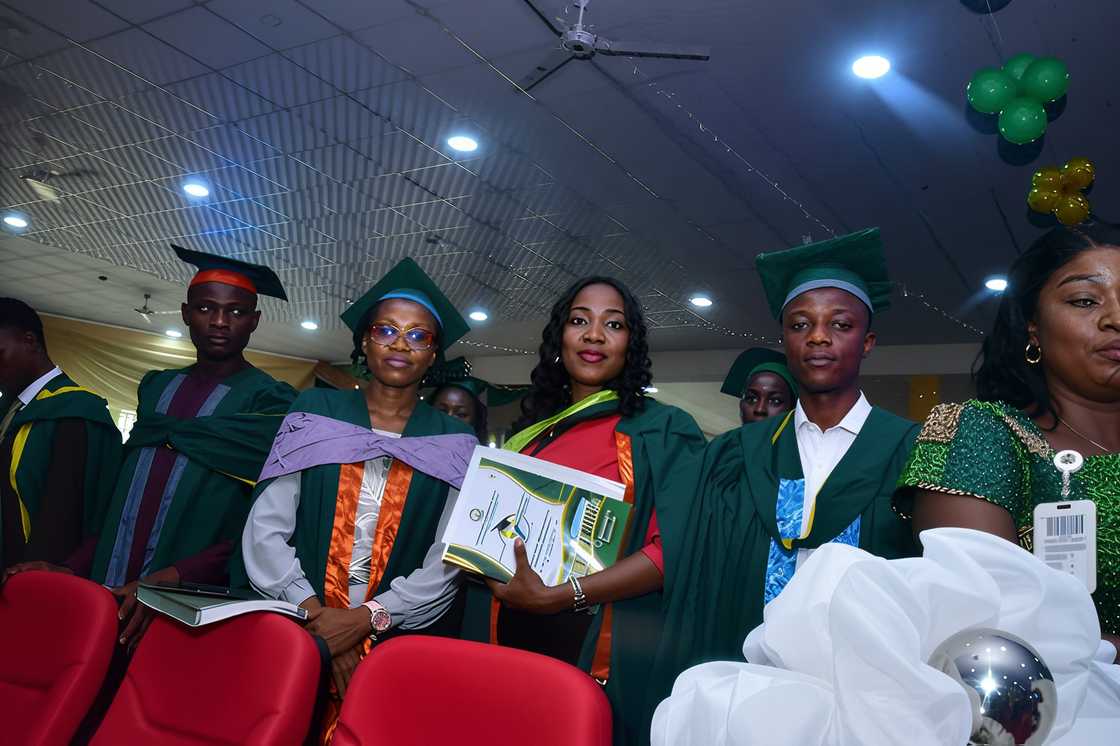 Federal University Oye-Ekiti students standing during graduation Federal University Oye-Ekiti students standing during graduation