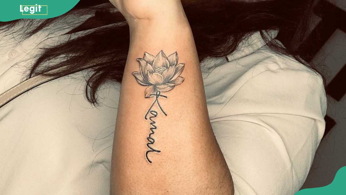 Lotus tattoo with name