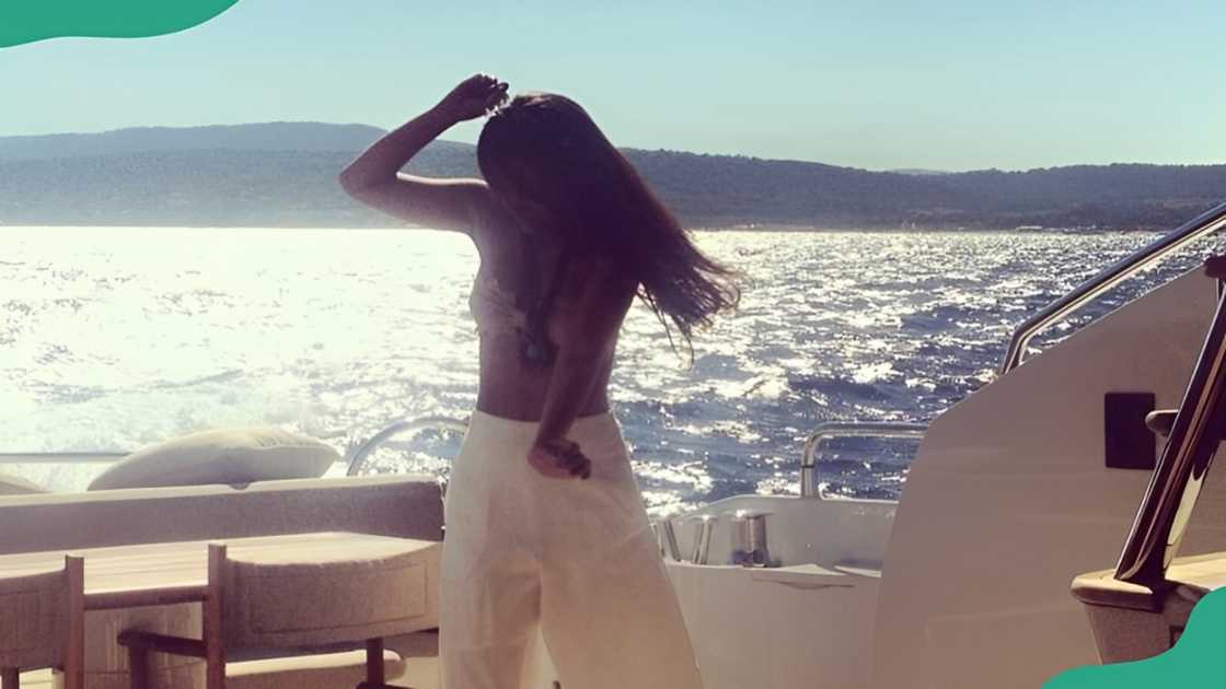 Liesl Martinez enjoys a moment by the beach