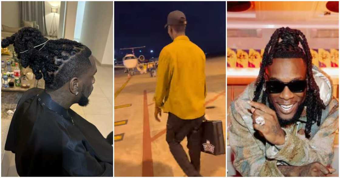Burna Boy flies out his barber. Burna Boy flies out his barber.
