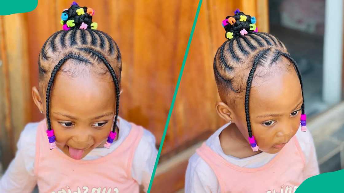 A girl wearing Updo cornrows with colored beads A girl wearing Updo cornrows with colored beads