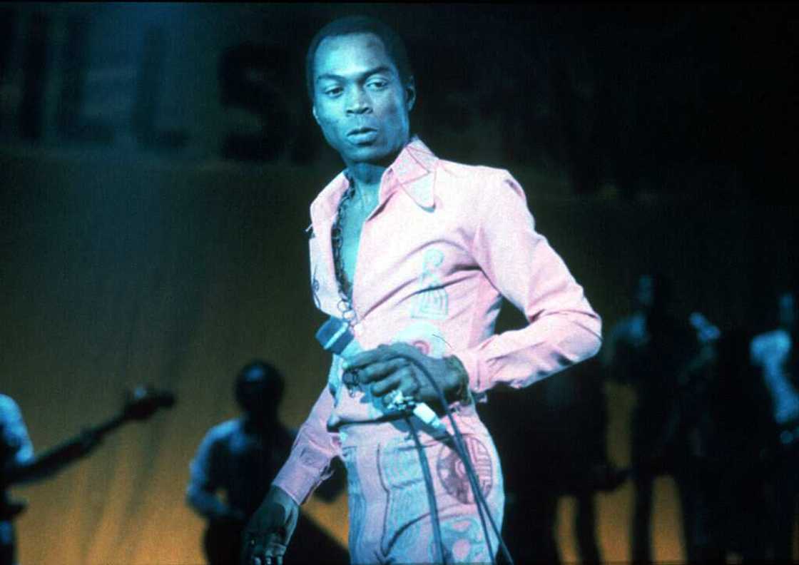 Fela Kuti performing on stage Fela Kuti performing on stage