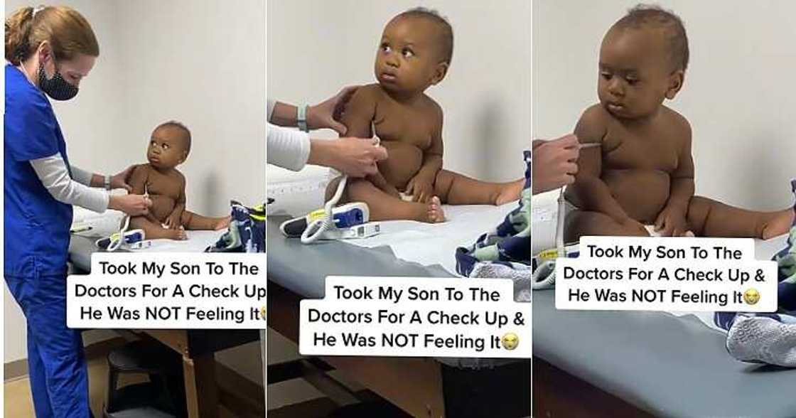 Little boy stares at doctor, serious look Little boy stares at doctor, serious look