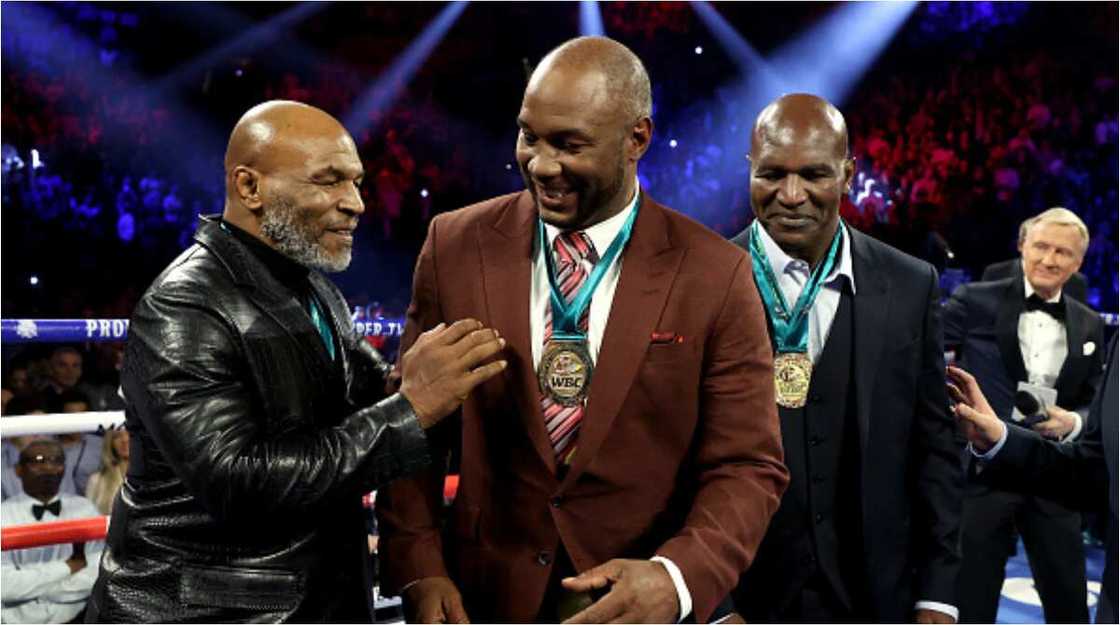 Anxiety in US as 54-year-old Mike Tyson reveals date for trilogy bout against Evander Holyfield Anxiety in US as 54-year-old Mike Tyson reveals date for trilogy bout against Evander Holyfield