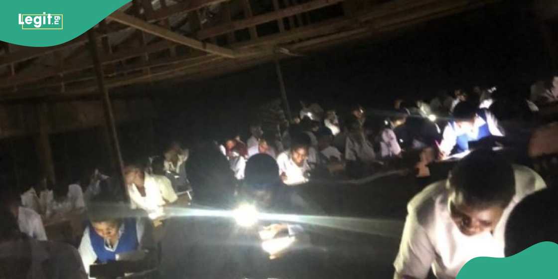 WASSCE candidates writes examination in darkness with torch lights WASSCE candidates writes examination in darkness with torch lights