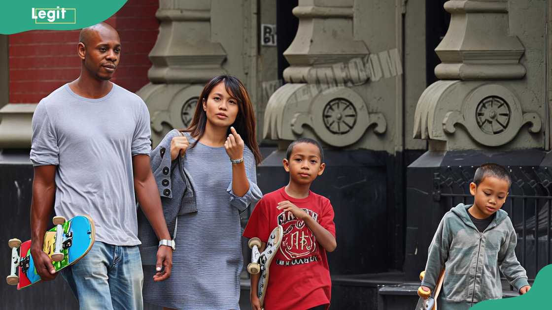 Sulayman with his parents and brother Ibrahim walking in the streets