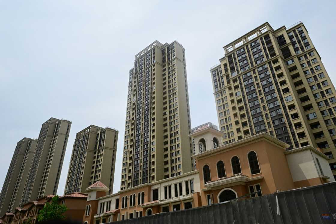 Unfinished apartments at a complex in  Xinzheng City in Zhengzhouin 2023. China is looking to slash taxes on home purchases as the government strengthens fiscal support for the ailing real estate sector