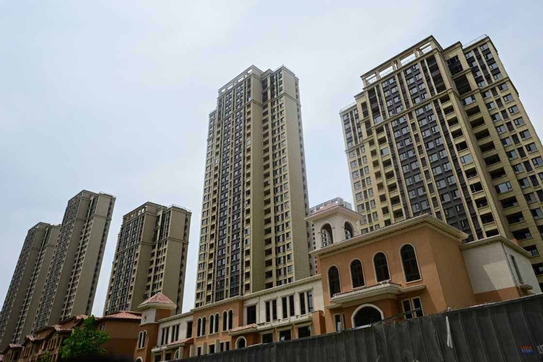 Unfinished apartments at a complex in Xinzheng City in Zhengzhouin 2023. China is looking to slash taxes on home purchases as the government strengthens fiscal support for the ailing real estate sector Unfinished apartments at a complex in Xinzheng City in Zhengzhouin 2023. China is looking to slash taxes on home purchases as the government strengthens fiscal support for the ailing real estate sector