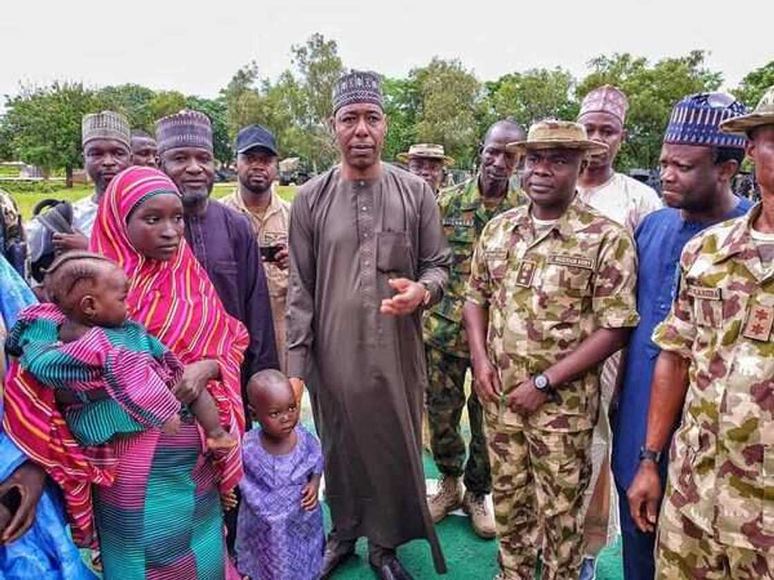 Zulum taking custody of Hassana in Gwoza town