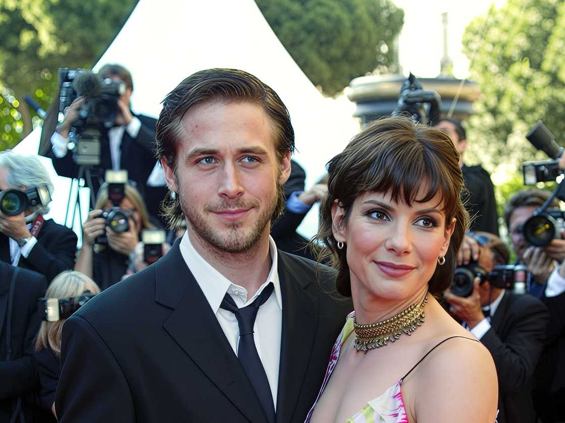 Actress Sandra Bullock and actor Ryan Gosling arrive at an entertainment event Actress Sandra Bullock and actor Ryan Gosling arrive at an entertainment event