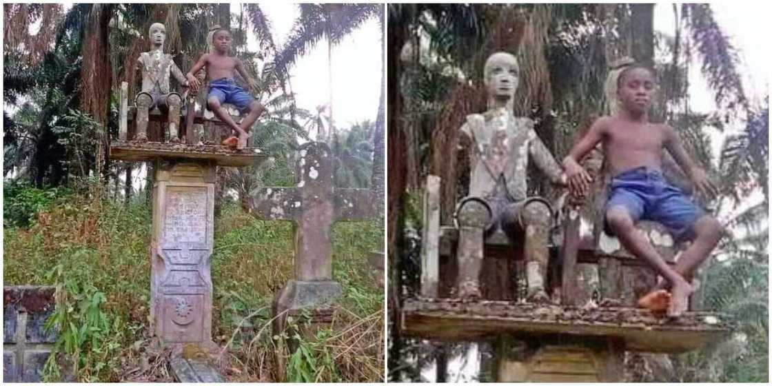 Nigerians react to photo of a young boy sitting beside a deity in a shrine, many say he is a spirit Nigerians react to photo of a young boy sitting beside a deity in a shrine, many say he is a spirit