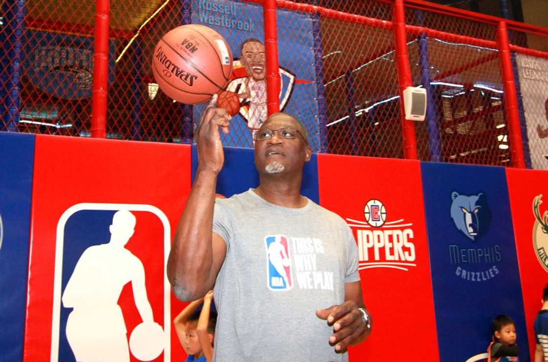 Dominique Wilkins plays basketball during NBA Center opening ceremony in Tianjin Dominique Wilkins plays basketball during NBA Center opening ceremony in Tianjin