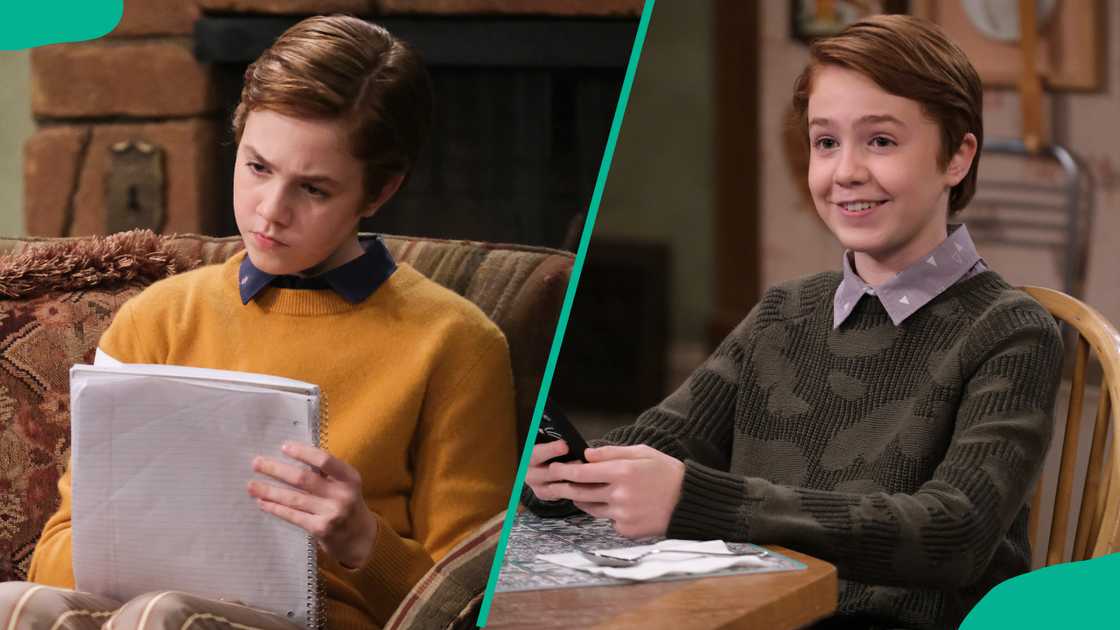 Ames McNamara writing in a book and sitting at a table Ames McNamara writing in a book and sitting at a table