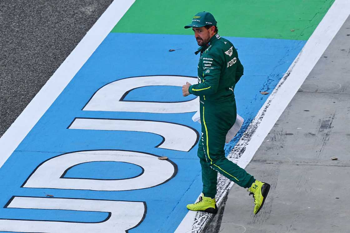 Fernando Alonso runs in the Pitlane at Bahrain International Circuit Fernando Alonso runs in the Pitlane at Bahrain International Circuit