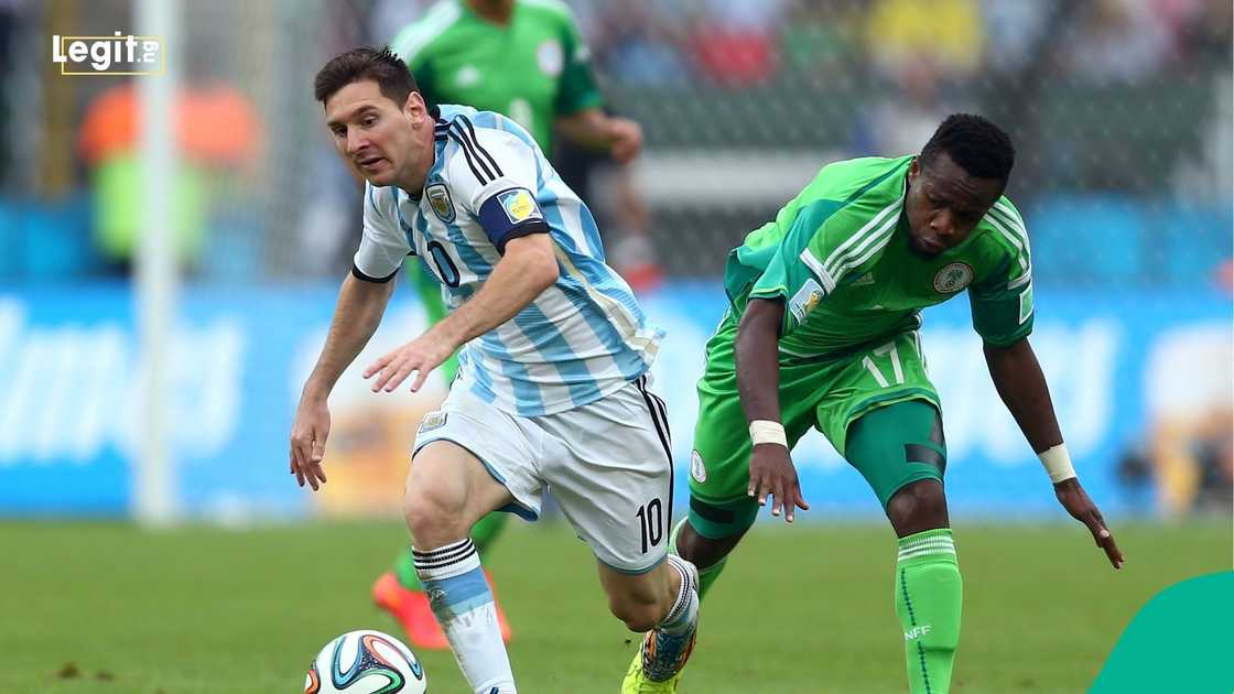 Lionel Messi, Ogenyi Onazi, Argentina, Nigeria, Super Eagles, 2014 World Cup, FIFA. Lionel Messi, Ogenyi Onazi, Argentina, Nigeria, Super Eagles, 2014 World Cup, FIFA.