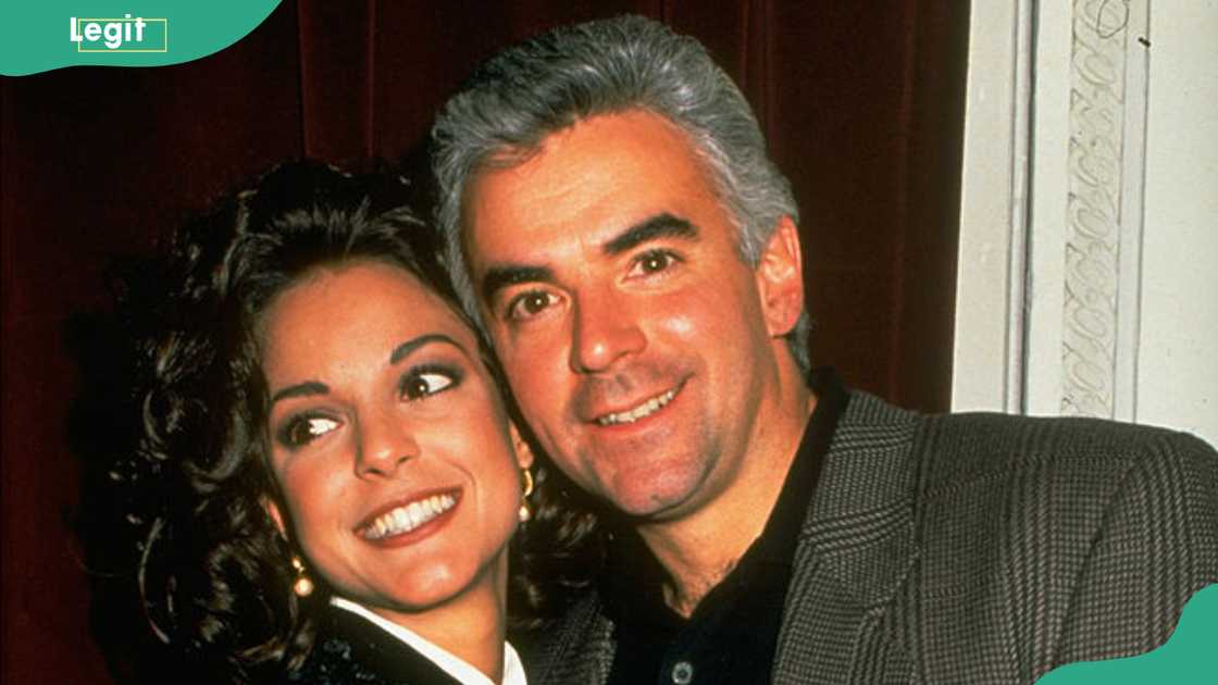 John O'Hurley & Eva La Rue pose together indoors
