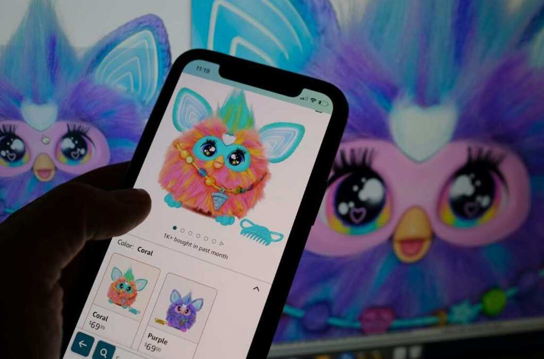 This illustration photo shows a smartphone screen with the recently relaunched Furby toy now on sale This illustration photo shows a smartphone screen with the recently relaunched Furby toy now on sale