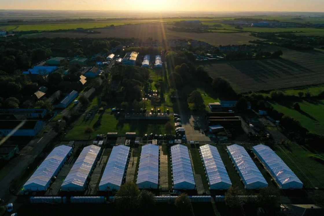 Some 4,000 asylum-seekers have been held at a former airbase at Manston, near Dover, which has a capacity of 1,600 Some 4,000 asylum-seekers have been held at a former airbase at Manston, near Dover, which has a capacity of 1,600