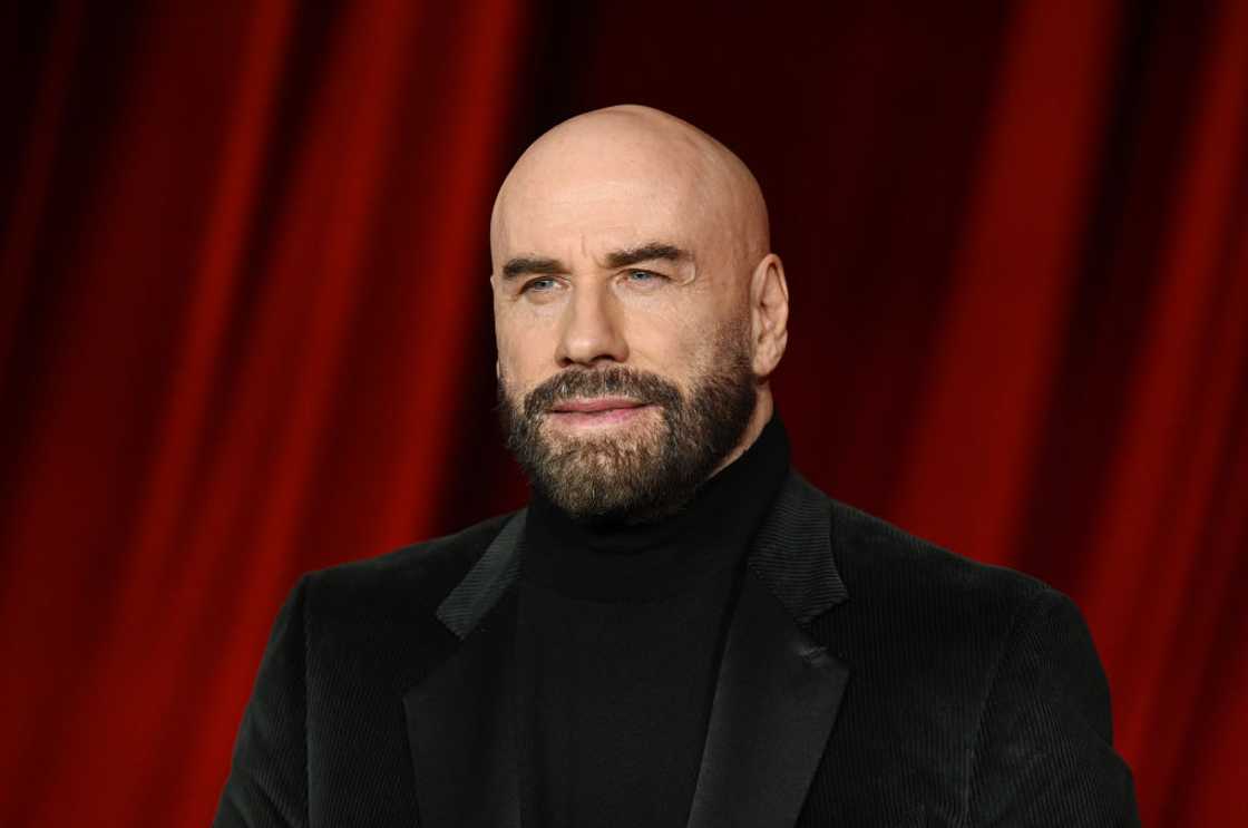 John Travolta poses at the Fourth Annual Academy Museum Gala