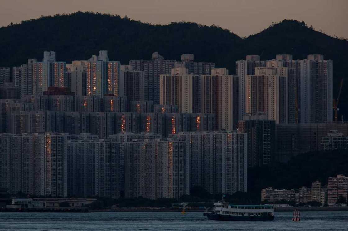 Hong Kong has tipped back into a technical recession, weighed down by mounting interest rates, weakened global trade and the city's continued adherence to strict coronavirus controls