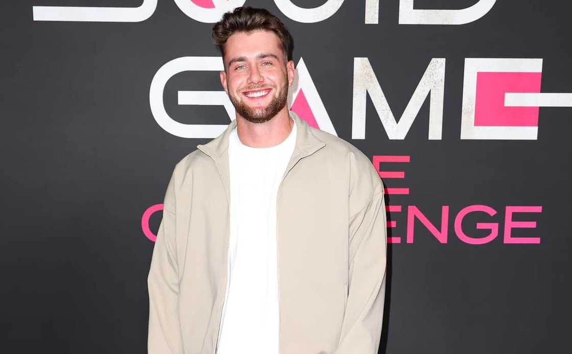 Harry Howsey on the red carpet at the Netflix Squid Game: The Challenge activation. Harry Howsey on the red carpet at the Netflix Squid Game: The Challenge activation.