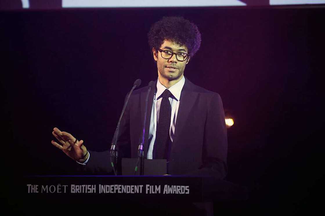 Richard Ayoade gives a speech at a film award event