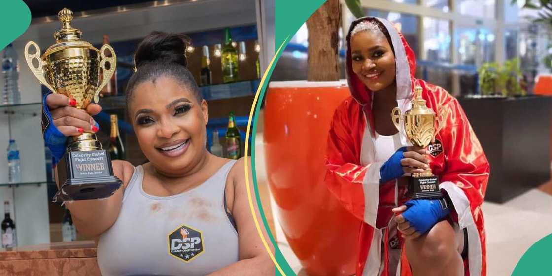 Laide Bakare and Chizzy Alichi pose with their boxing trophy. Laide Bakare and Chizzy Alichi pose with their boxing trophy.