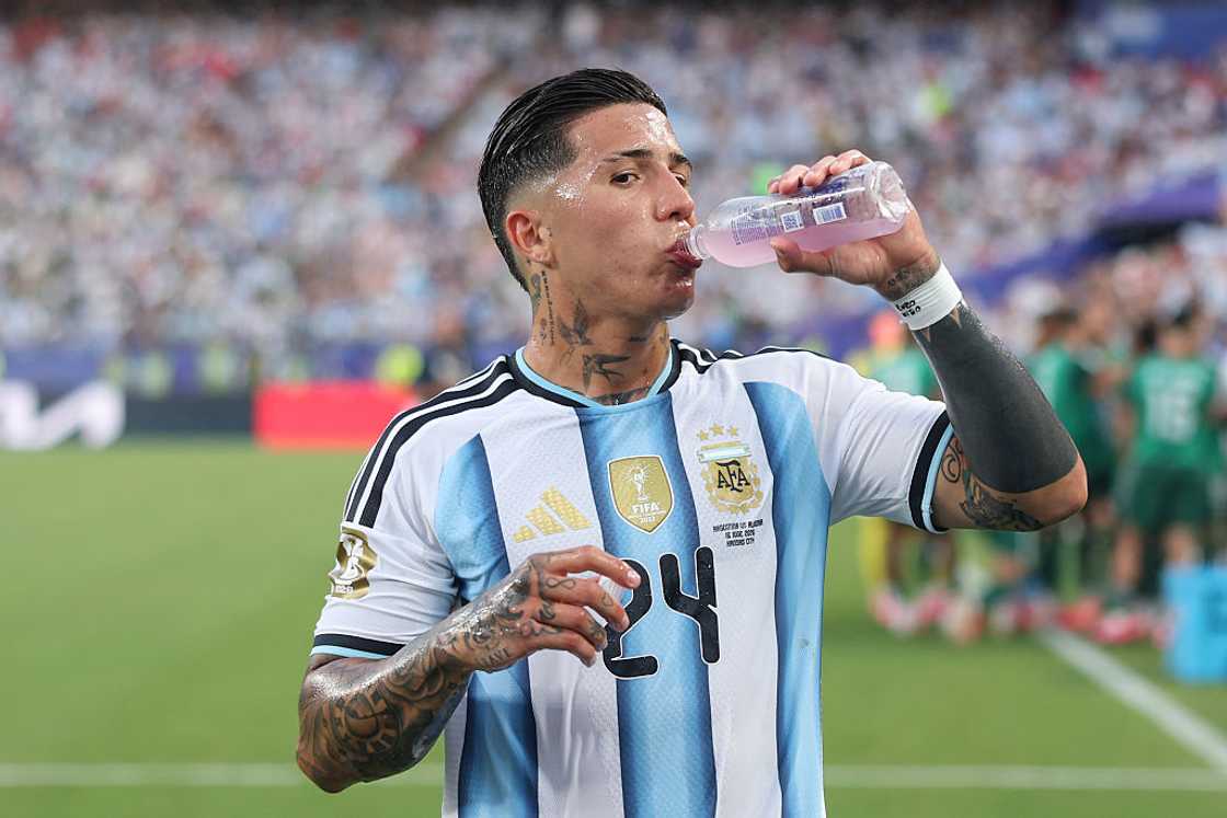 Argentina's soccer player Enzo Fernández hydrating